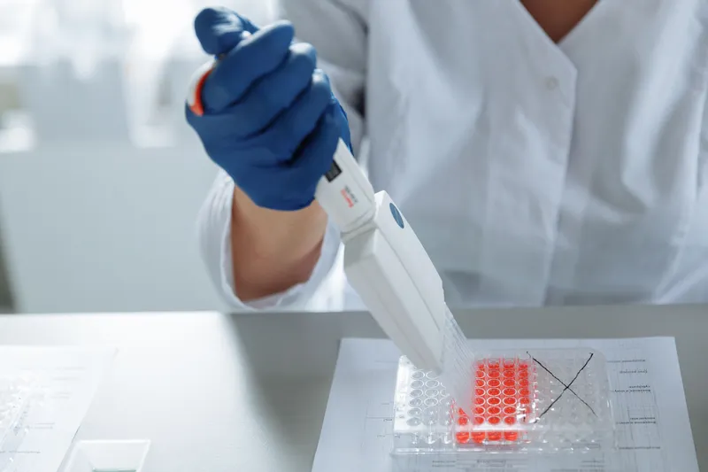 Pharmaceutical research scientist developing new formulations at May & Baker